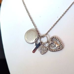 Stainless neck w religious charms